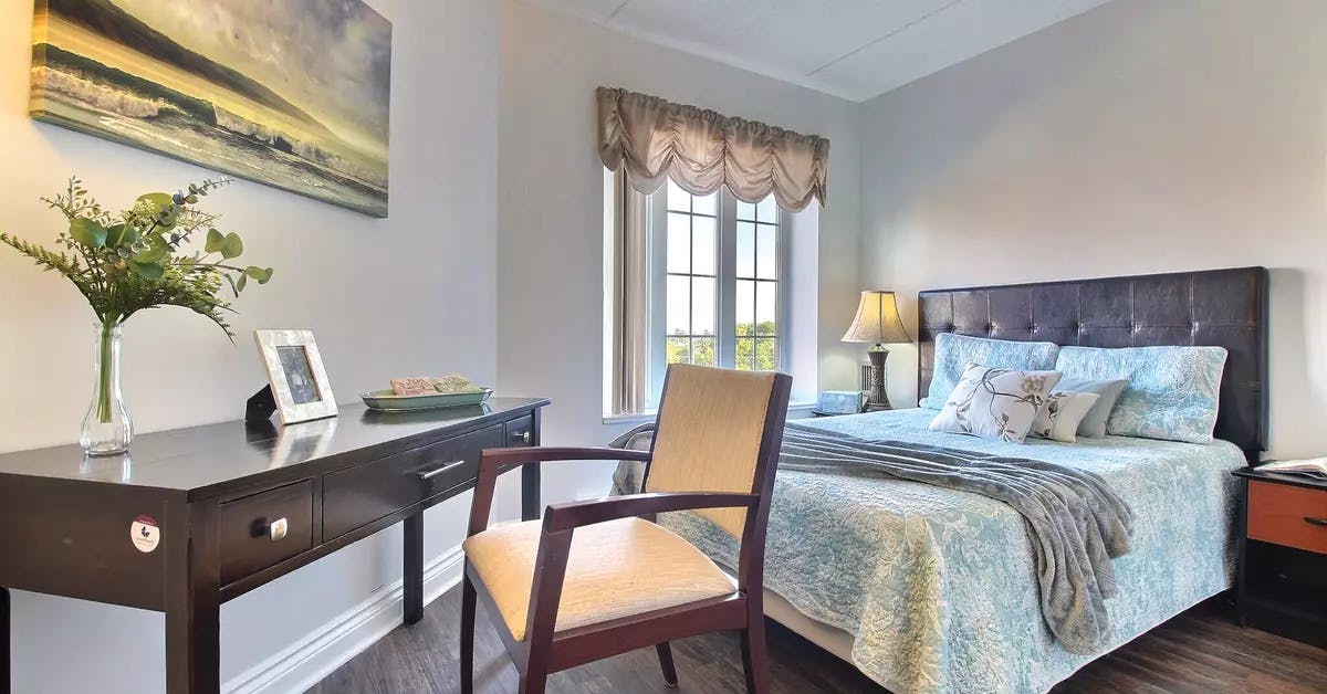 one bedroom suite at chartwell belcourt retirement residences résidence pour retraités chambre à coucher appartement modèle