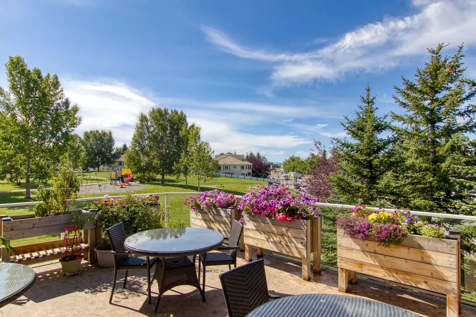 stunning patio with garden views at chartwell royal park retirement residence