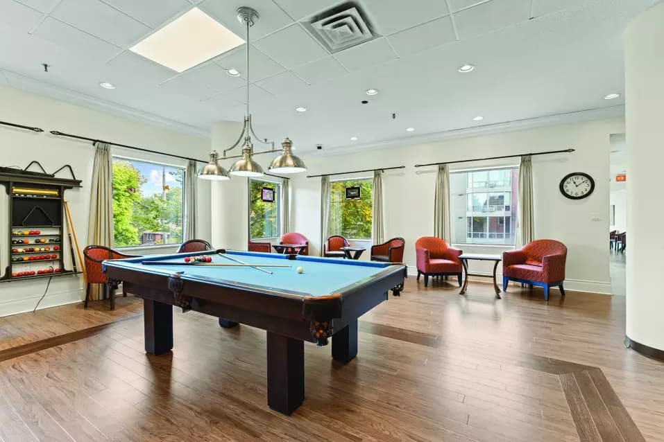 Spacious and illuminated common area of Chartwell Grenadier Retirement Residence 