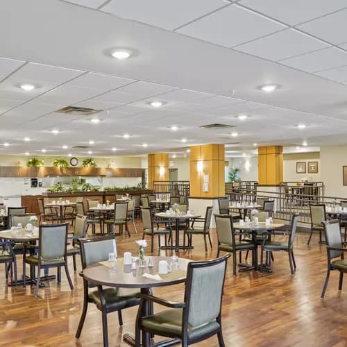 beautiful dining room at chartwell heritage valley retirement residence