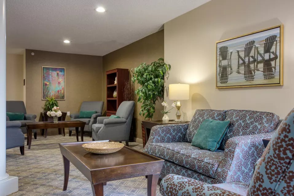 cozy lounge at chartwell royal park retirement residence