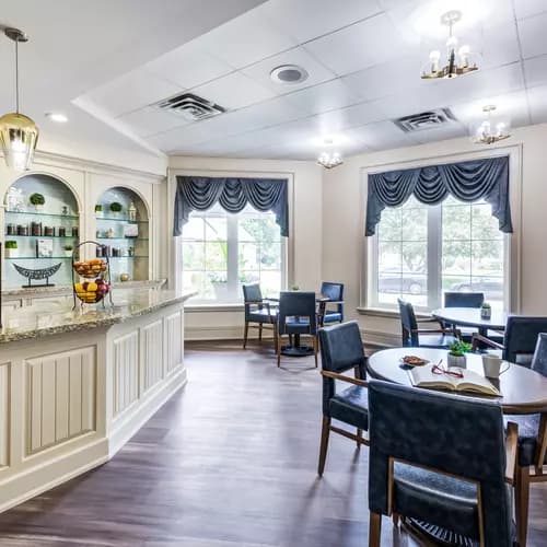 Bistro with seating at Chartwell Queen's Square Retirement Residence