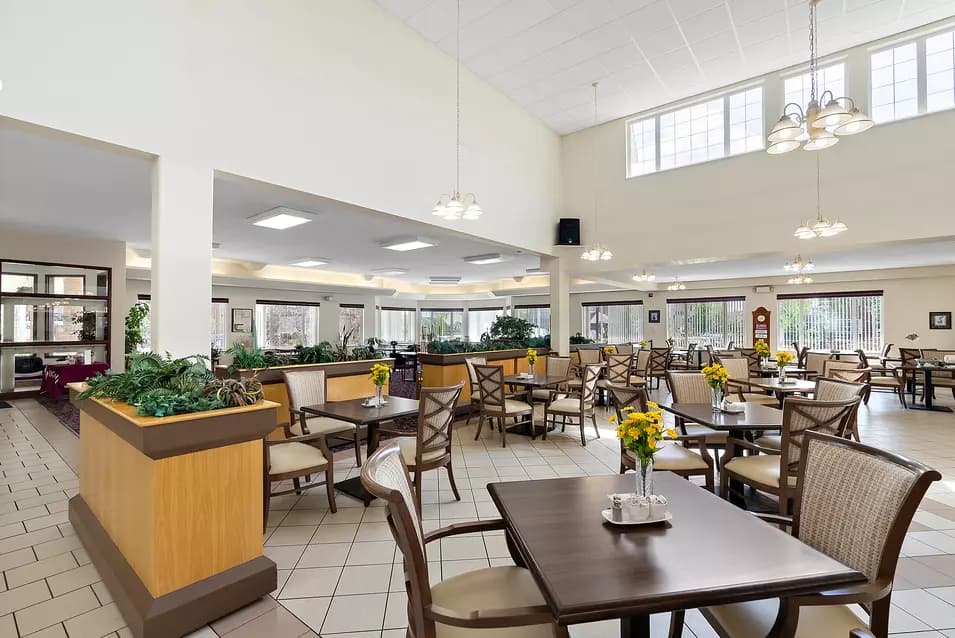 chartwell griesbach, dining room, tables, chairs, table tops, yellow flowers