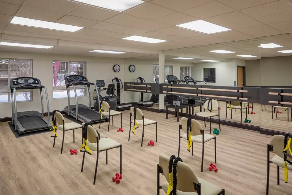 modern fitness facility at chartwell fountains of mission retirement residence