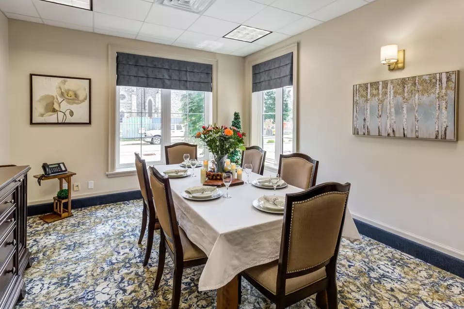Bright and spacious private dining room at Chartwell Queen's Square Retirement Residence