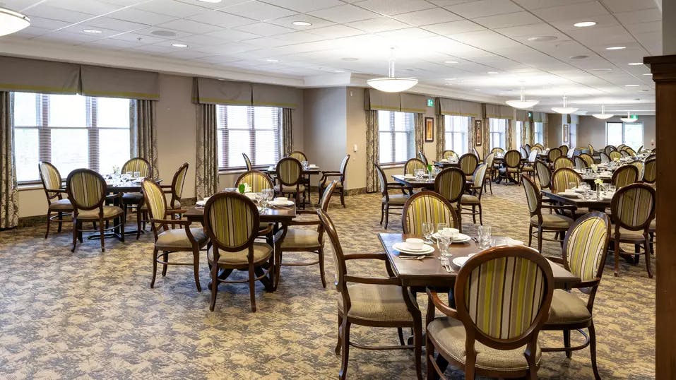 Spacious and bright dining room at Chartwell Balmoral Retirement Community.
