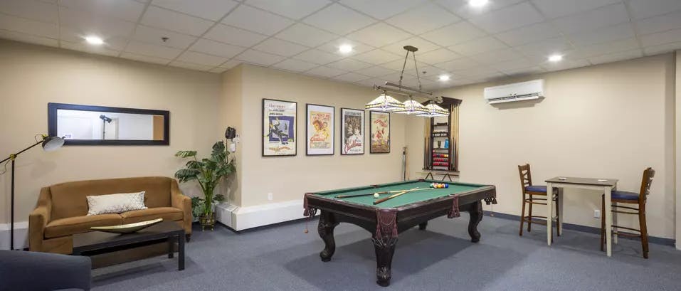 billiards room at chartwell pickering city centre retirement residence