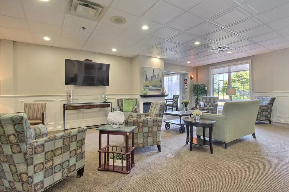 lounge with tv at chartwell empress kanata retirement residence
