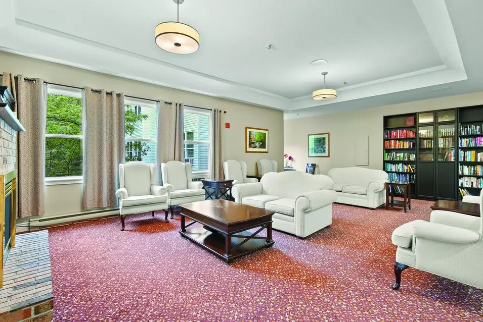 Open concept lounge and library at Chartwell Georgian Retirement Residence.