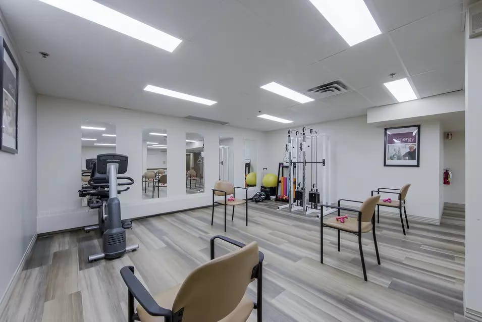 Chartwell Terrace on the Square's fitness room with exercise equipment