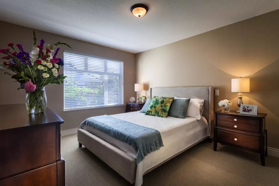Beautiful bedroom in Chartwell Churchill House Retirement Residence suite
