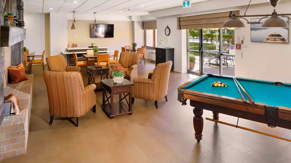 Billiards and games room at Chartwell Park Place Retirement Residence. 