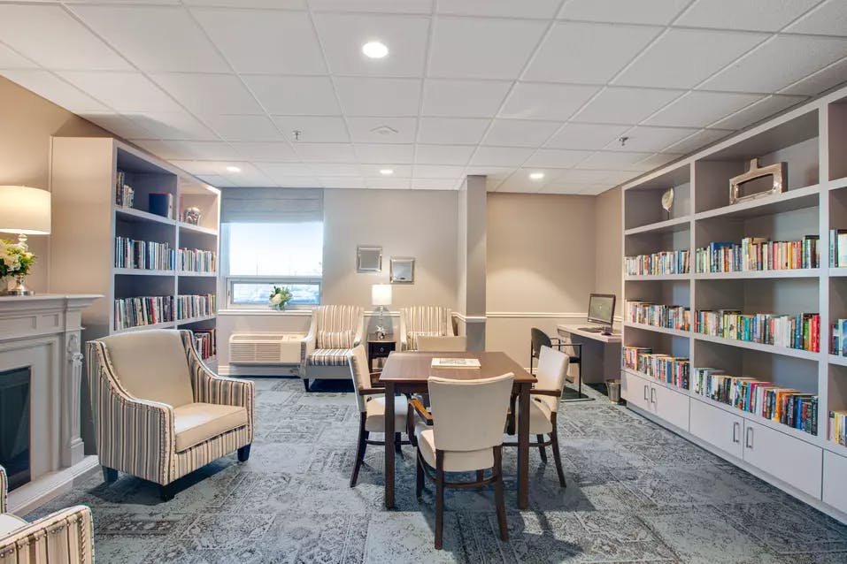 Chartwell Lakeshore Retirement Residence  library with fireplace