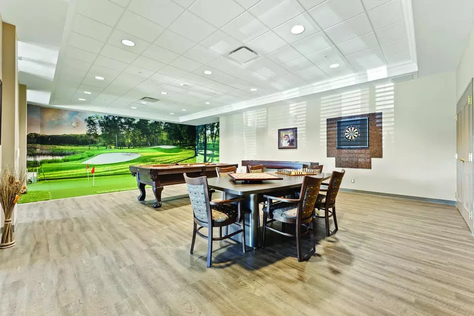games room at chartwell bowmanville creek retirement residence