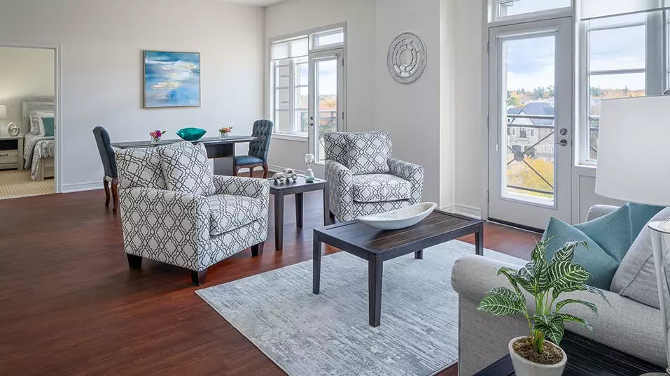 Open and spacious suite living room at Chartwell Oak Ridges Retirement Residence.