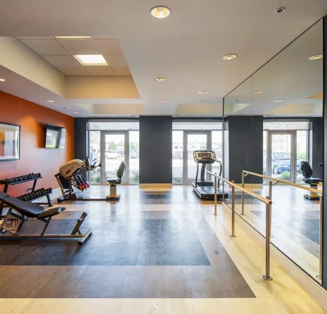 Chartwell Montgomery Village Retirement Residence fitness room with exercise equipment