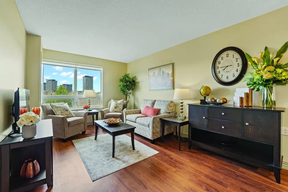 Chartwell Oakville Retirement Residence suite living room with large windows