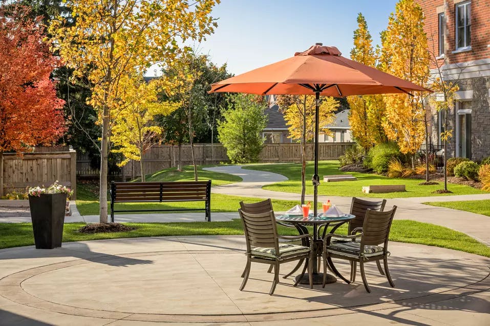 outdoor patio and walking paths at chartwell harwood retirement residence