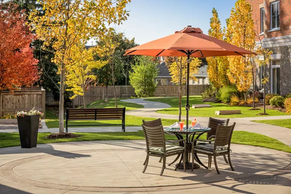 outdoor patio and walking paths at chartwell harwood retirement residence