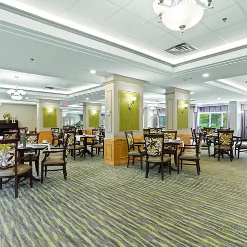 Bright and spacious dining room at Chartwell Scarlett Heights Retirement Residence