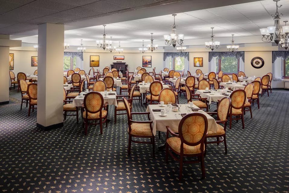 Spacious and open dining room at Chartwell Park Place Retirement Residence. 