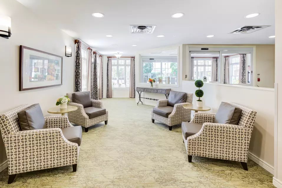 Bright and open lounge at Chartwell Orchards Retirement Residence