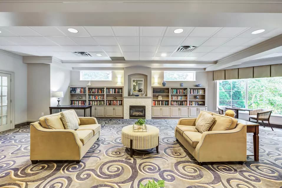 Lounge with fireplace at Chartwell Bankside Retirement Residence