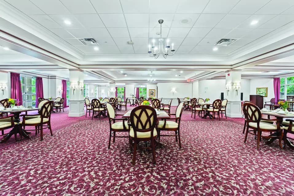 Dining room with amazing natural light at Chartwell Robert Speck Retirement Residence