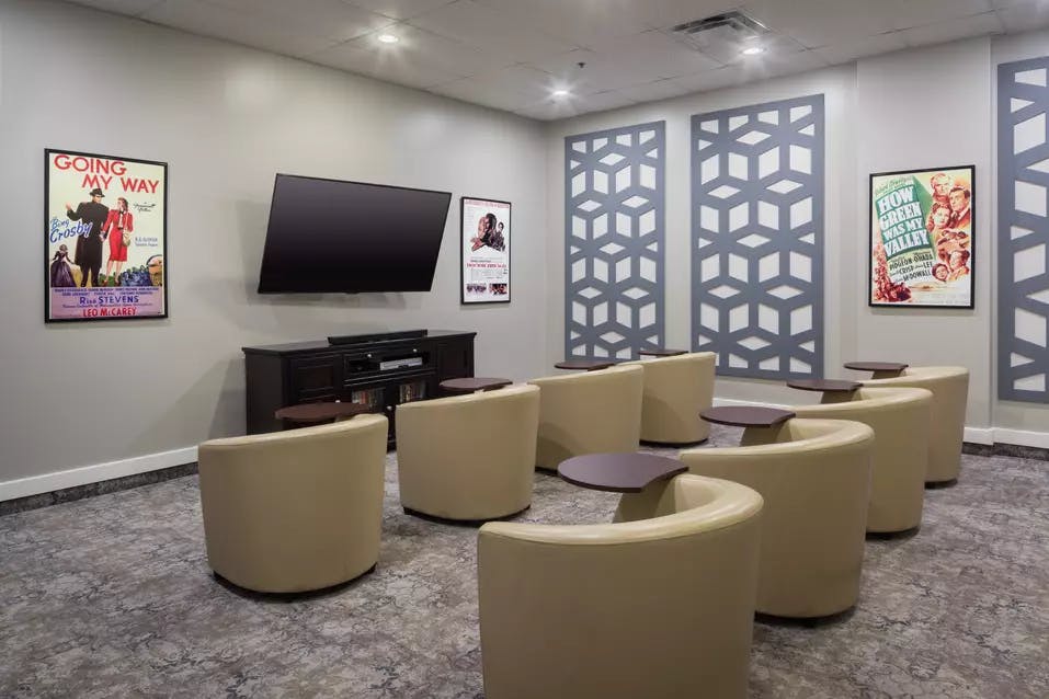 modern movie theatre at chartwell kamloops retirement residence