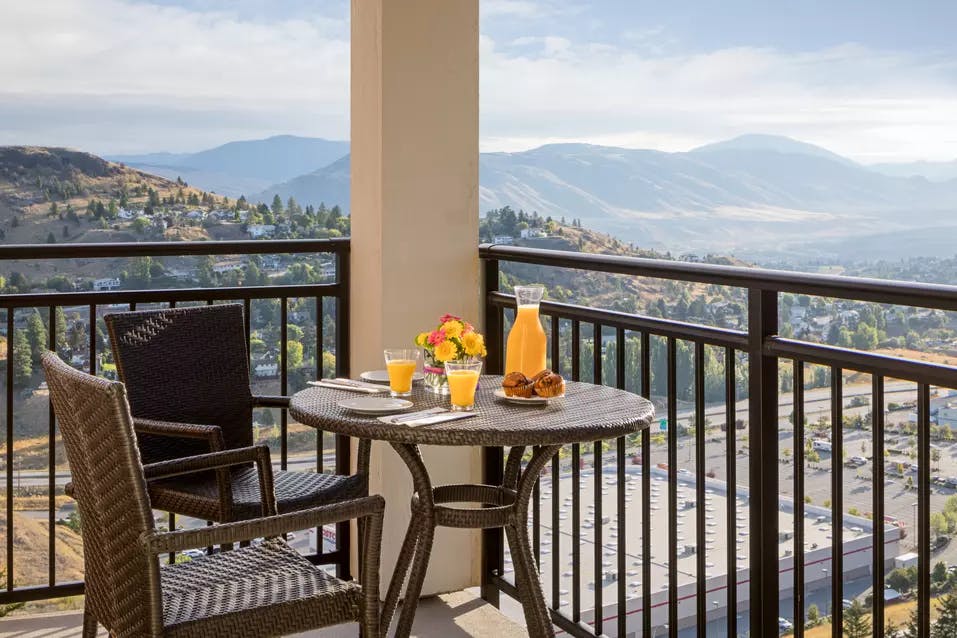 stunning balcony picture with mountains at chartwell ridgepointe retirement residence