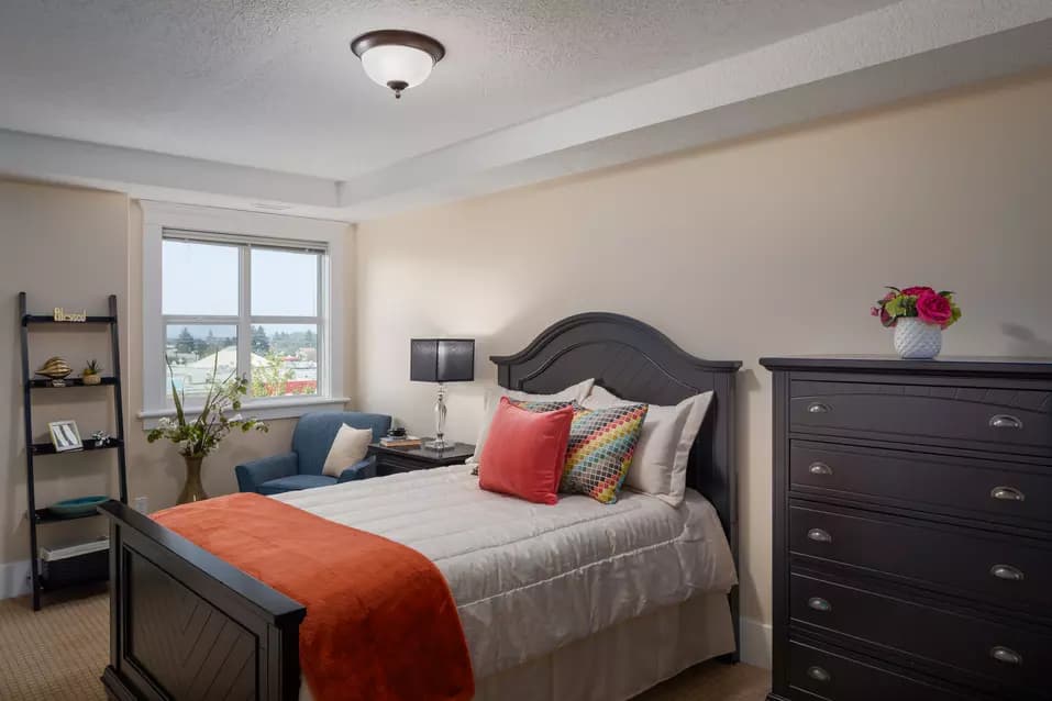 cozy and bright bedroom at chartwell kamloops retirement residence