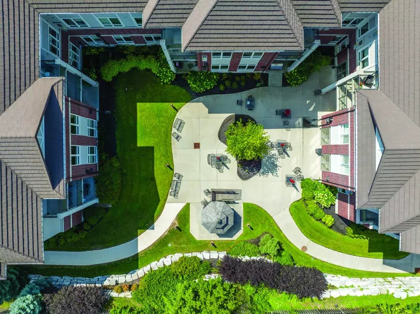 aerial view of outdoor gardens and walking paths at Chartwell Deerview Crossing Retirement Residence