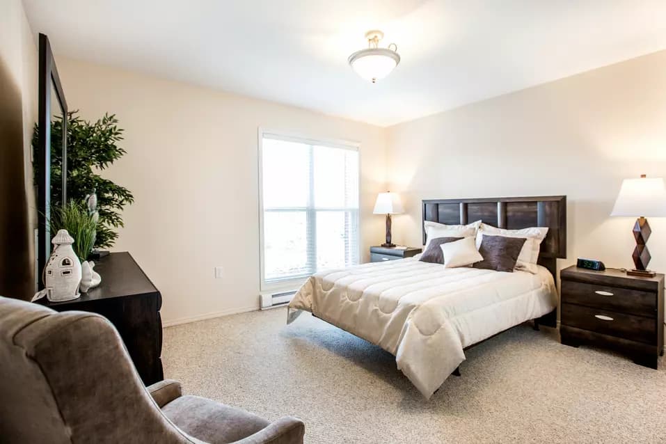 beautiful bedroom at chartwell hawthorn retirement residence