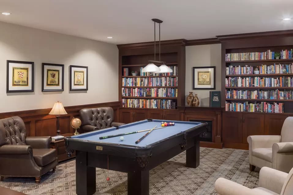 pool table and large comfortable chairs at chartwell chatsworth retirement residence