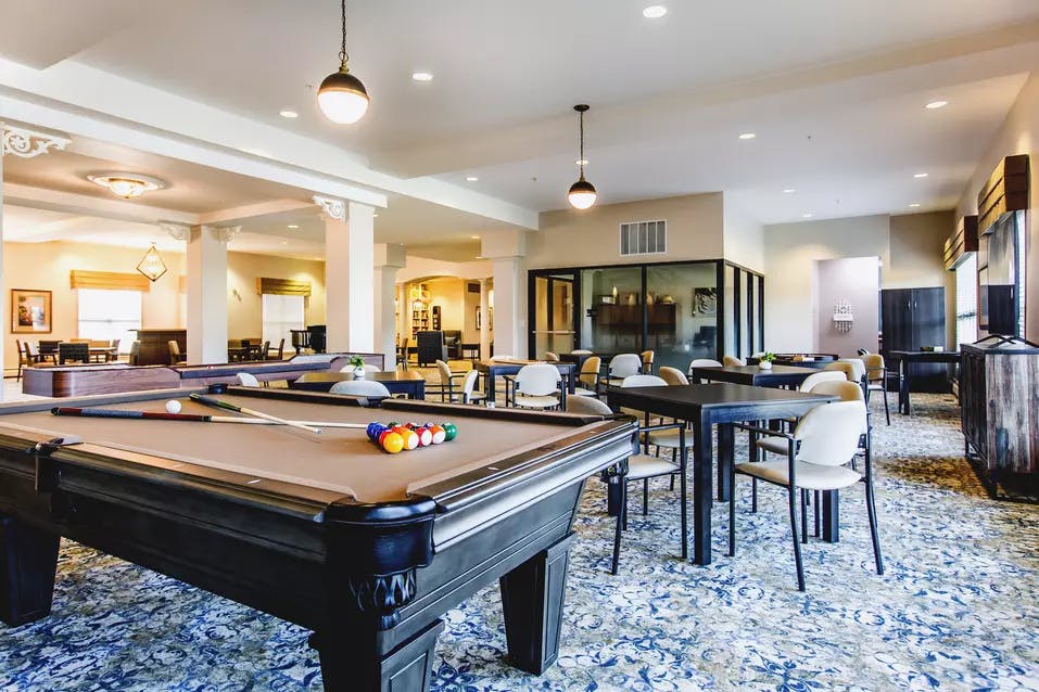 pool table and games lounge at chartwell hawthorn retirement residence