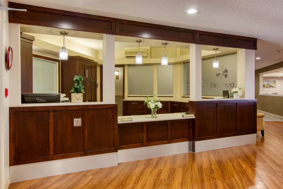 inviting reception desk at chartwell royal park retirement residence
