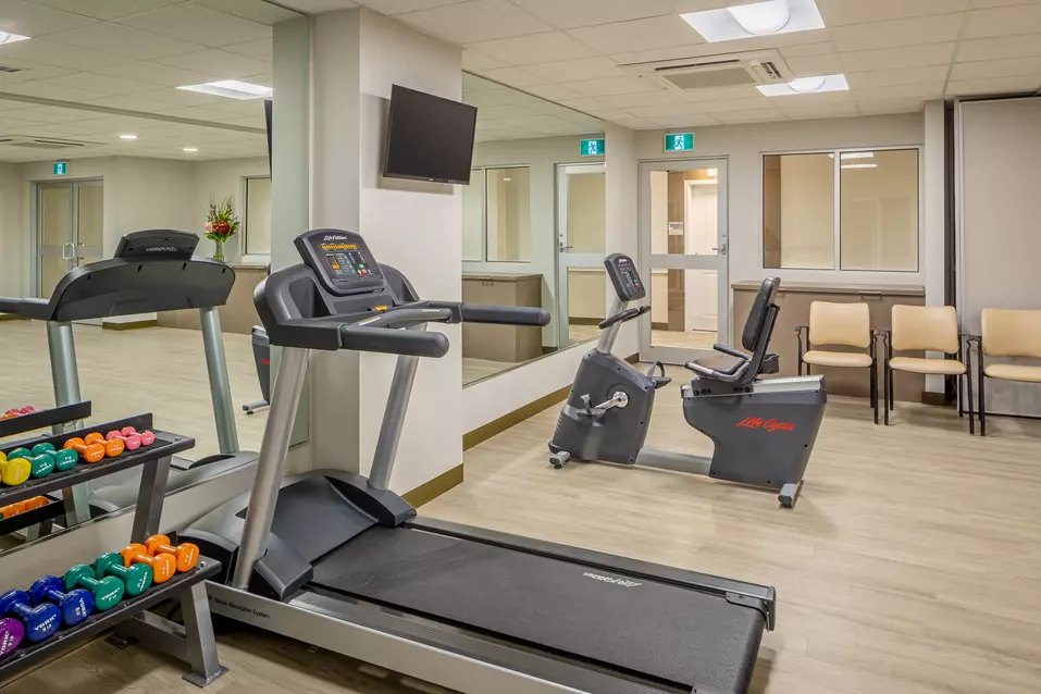 modern fitness room at chartwell carlton retirement residence