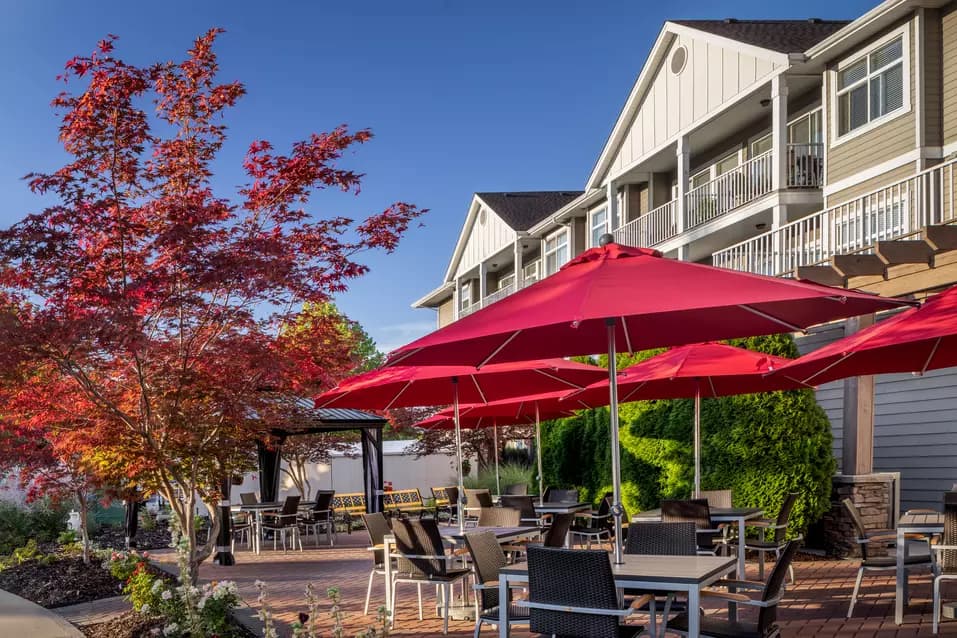 inviting patio with furniture at chartwell chatsworth retirement residence