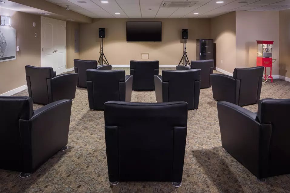 modern movie theatre at chartwell ridgepointe retirement residence
