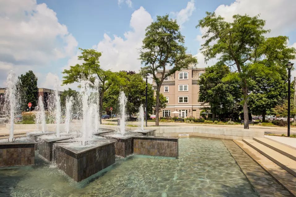 Outdoor fountain at Chartwell Queen's Square Retirement Residence