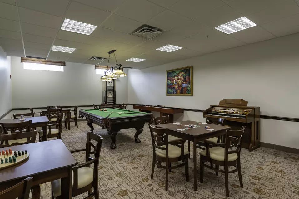 Billiards and games room at Chartwell Georgian Traditions Retirement Residence.
