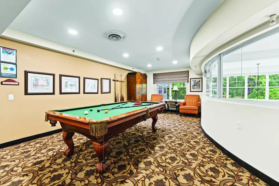 Time to have fun in one of the common areas of Chartwell Rouge Valley Retirement Residence 