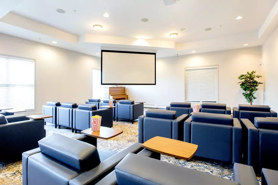 modern movie theatre at chartwell hawthorn retirement residence
