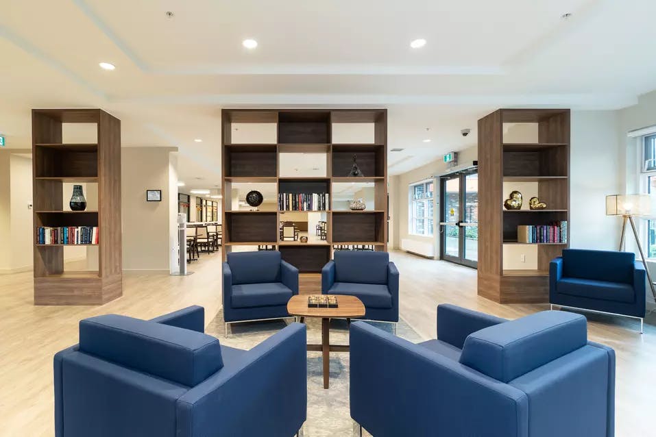 spacious lounge at chartwell camellia retirement residence