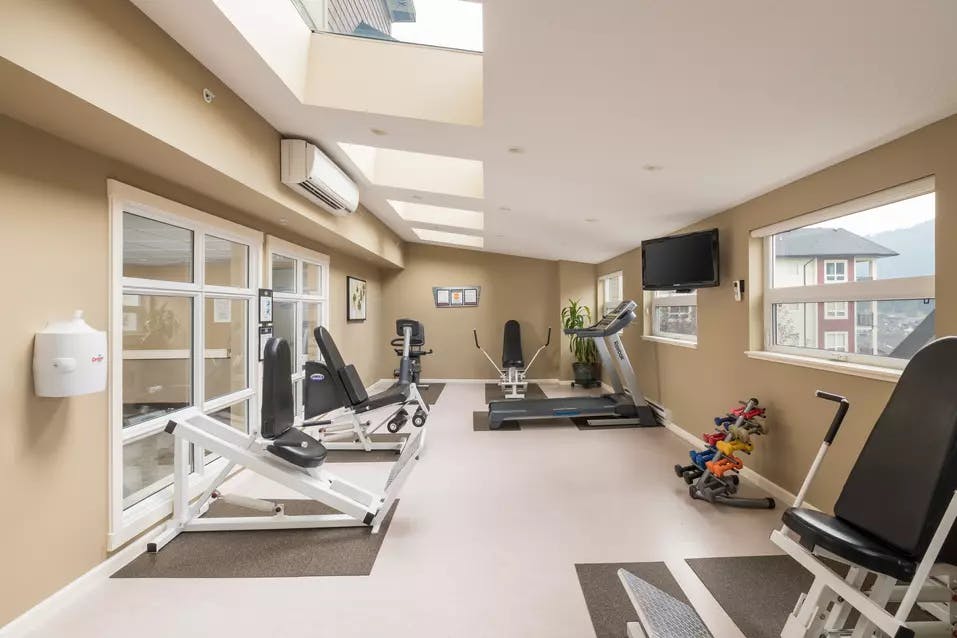 modern fitness facility at chartwell ridgepointe retirement residence