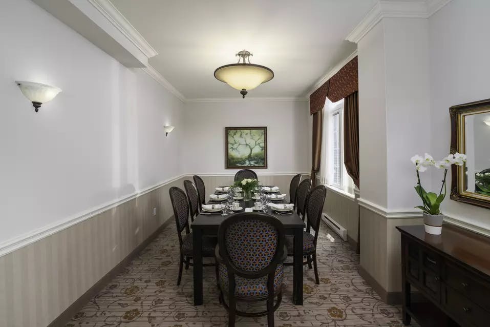 Welcoming private dining room at Chartwell Georgian Traditions Retirement Residence.