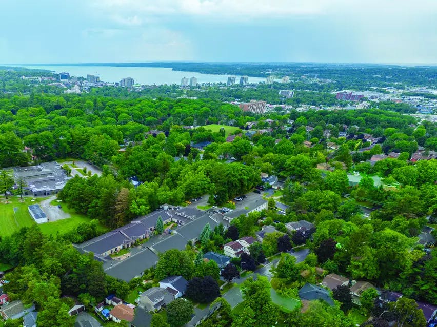 Aerial view of greenspace at Chartwell Whispering Pines Retirement Residence.