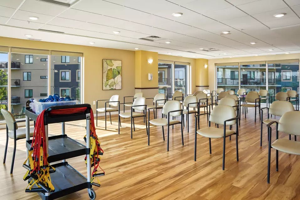 modern fitness facility at chartwell heritage valley retirement residence