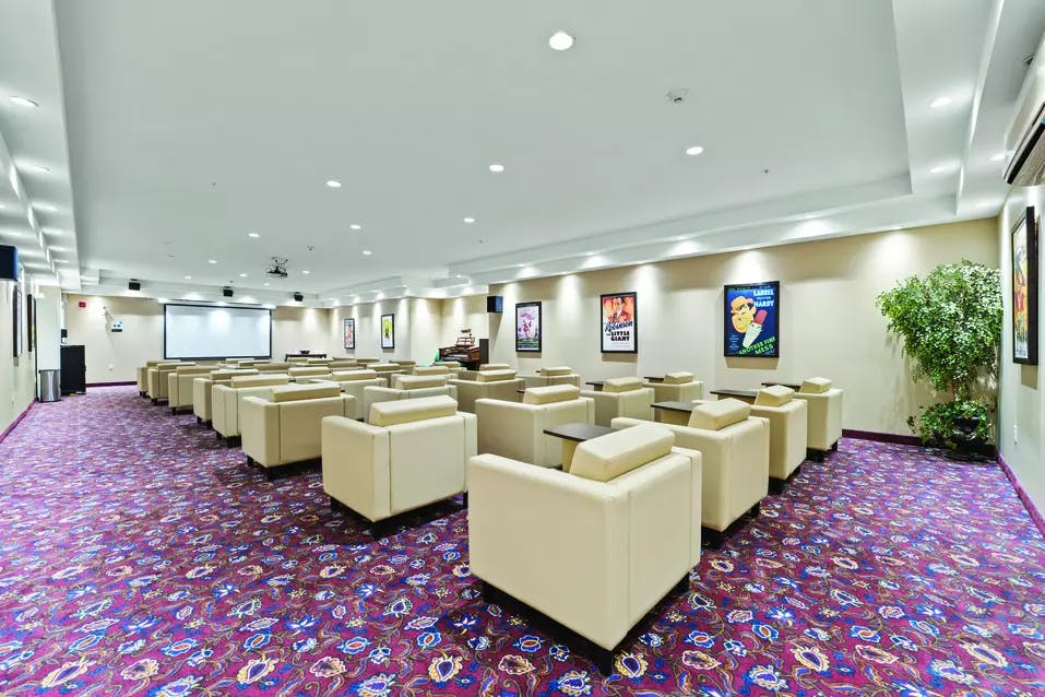 Movie theatre at Chartwell Barton Retirement Residence.