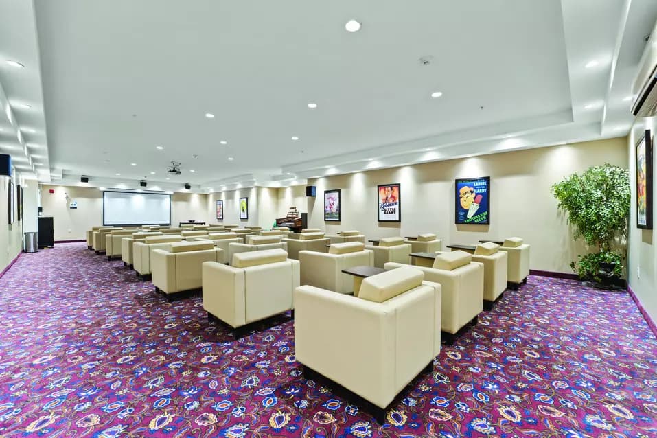 Movie theatre at Chartwell Barton Retirement Residence.